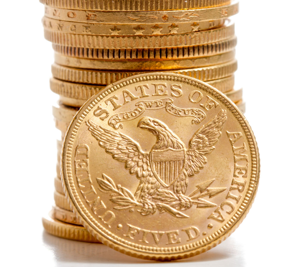 stack of gold American eagle coins